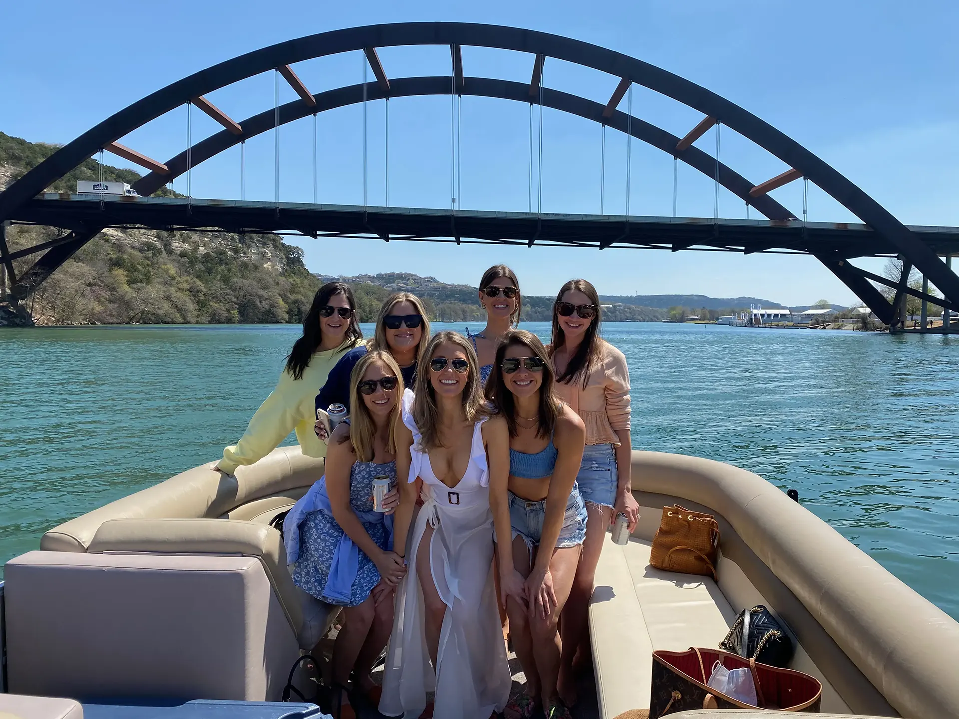 Friends enjoying a private bachelorette boat party on Lake Austin